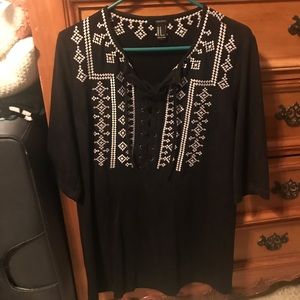 Black faux suede dress with tie detail in front!